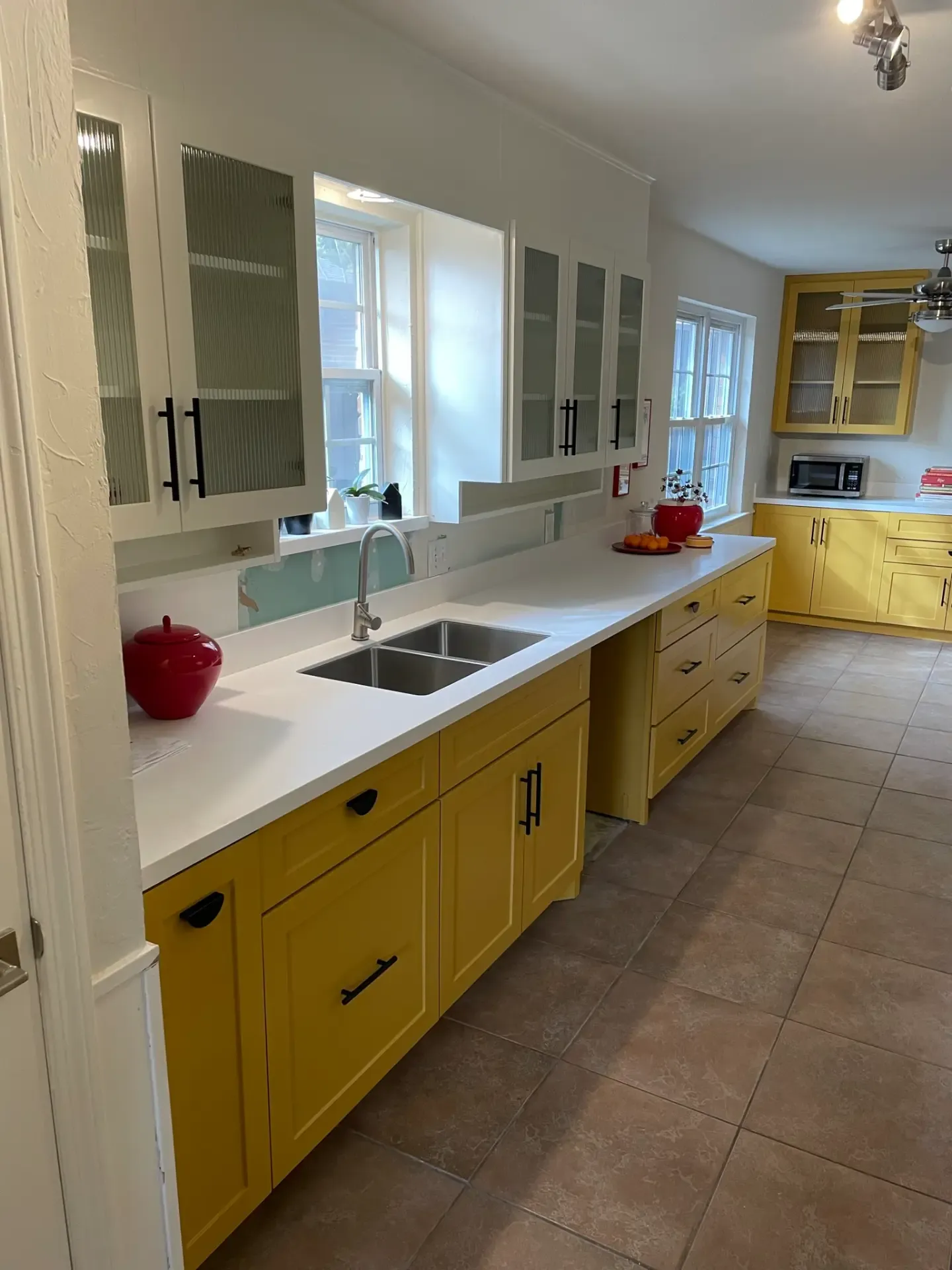 Yellow kitchen cabinets installed by DFW Cabinets